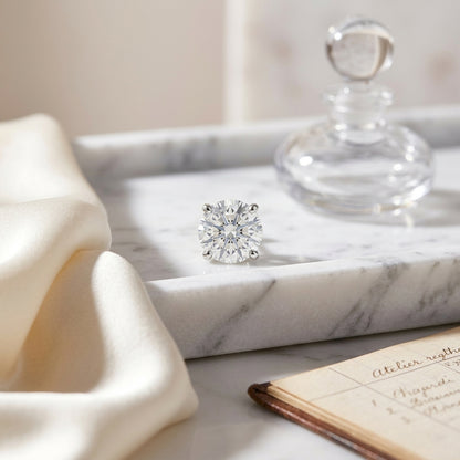 Platinum Bezel Set Round Brilliant Diamond Stud Earrings (0.75 Ct. T.w., Si1-si2 Clarity, J-k Color) — atelier still life