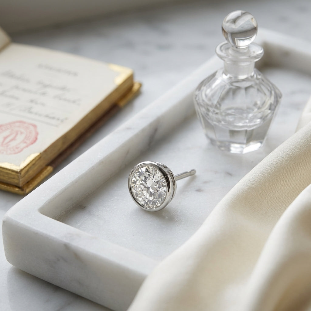 Platinum Bezel Set Round Brilliant Diamond Stud Earrings (1.06 Ct. T.w., Vs1-vs2 Clarity, F-g Color) — atelier still life