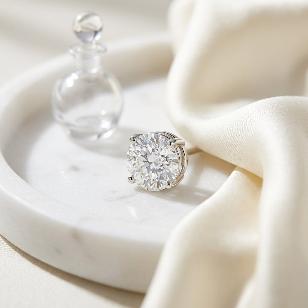 Platinum Bezel Set Round Brilliant Diamond Stud Earrings (1.47 Ct. T.w., Si1-si2 Clarity, H-i Color) — atelier still life