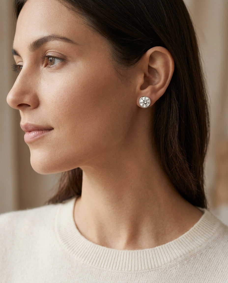 Platinum Bezel Set Round Brilliant Diamond Stud Earrings (2.09 Ct. T.w., Vs1-vs2 Clarity, H-i Color) — editorial close-up